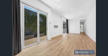 MODERN AND WELL APPOINTED IN CONVENIENT LOCATION - Photo 5