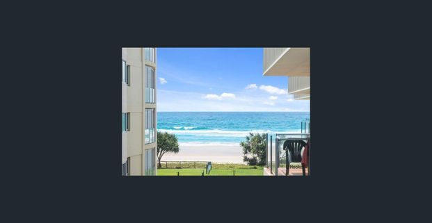 SPACIOUS BEACHFRONT LIVING - TOP FLOOR APARTMENT - Photo 1