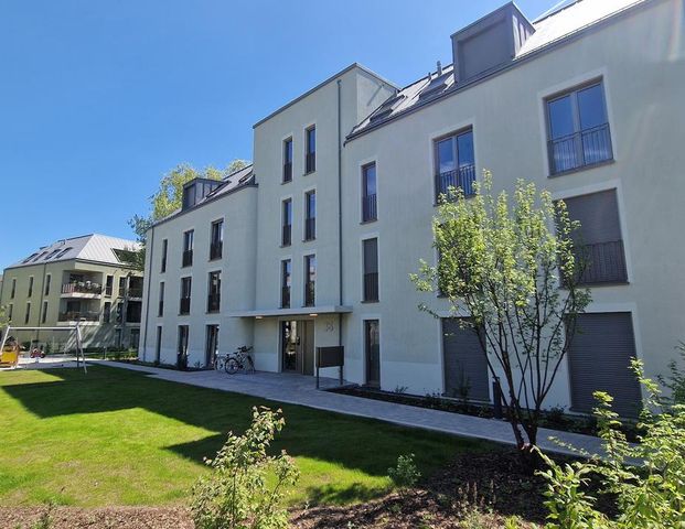 Moderne Neubauwohnung mit Gartenanteil - Foto 1