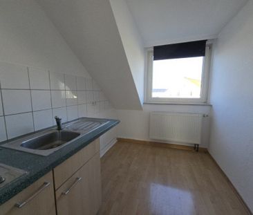 Kleine Dachgeschosswohnung direkt am Dreiecksplatz in Gütersloh - Foto 4