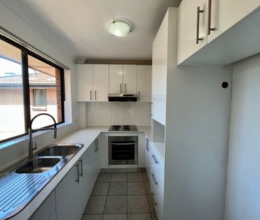 Fully Upgraded Apartment with Balcony & LUG! - Photo 3