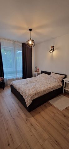 Przestronne mieszkanie z ogrodem i garażem - Zdjęcie 2