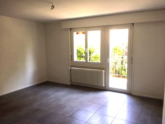 Magnifique appartement de 2.5 pièces au rez-de-chaussée avec terrasse privative - Photo 1