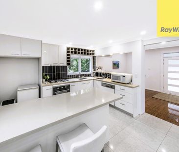 Stunningly Renovated 5-Bedroom Family Oasis with Pool and Garage! - Photo 6