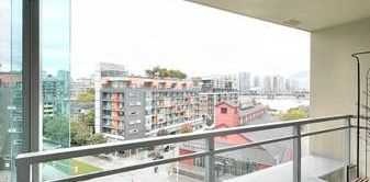 Furnished 2BR+ Den in Olympic Village – Monthly Rental Welcome - Photo 2