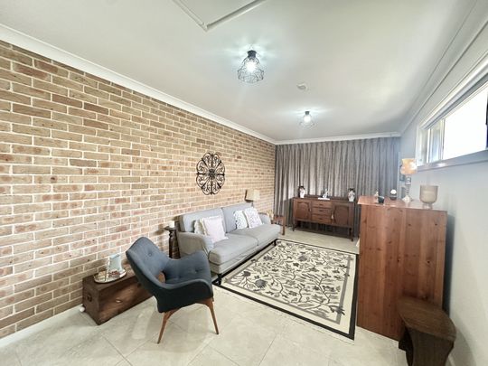 Modern and Low Maintenance living in Peaceful Elderslie - Photo 1