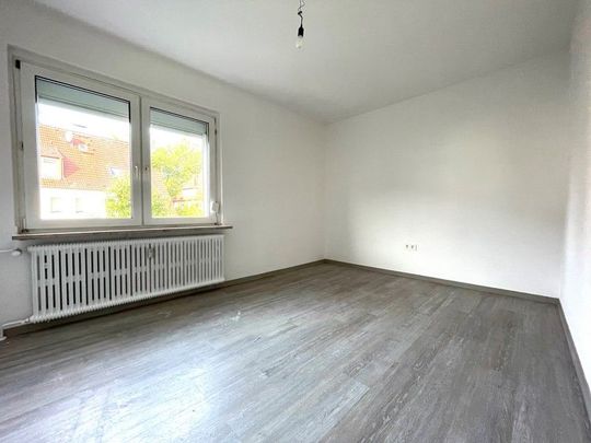 Besondere 4-Zimmer Wohnung mit eigener Terrasse und Gemeinschaftsgarten! - Foto 1