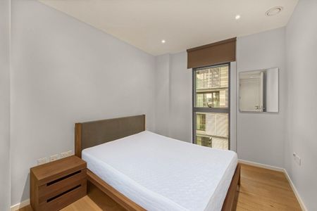 A bright and beautifully presented two-bedroom, two‑bathroom apartment set on the third floor of the highly sought‑after Arthouse development. - Photo 4