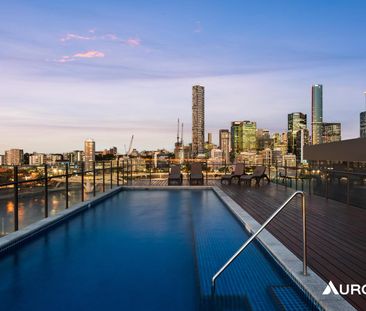 Stylish One-Bedroom Apartment with River Views and Expansive Balcony - Photo 5