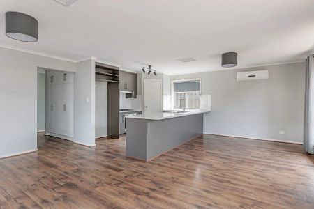 Three Bedroom Two Bathrooms In Wanted Locale - Photo 3