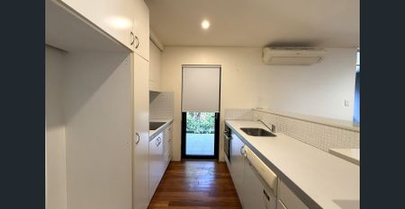 Modern, spacious and perfectly positioned in the heart of Redfern - Photo 5