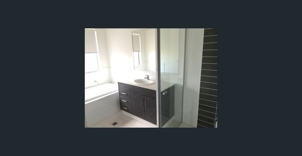 Family Home In Coomera Springs with several living areas and large yard - Photo 1