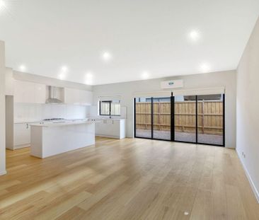 Beautifully Designed 4-Bedroom Family Home in Prime Location - Photo 3