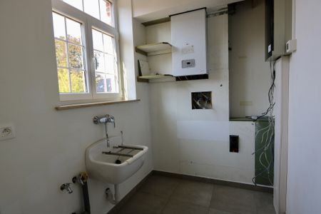 Bel-etagewoning met 3 slaapkamers, balkon, tuintje en garage. - Photo 4