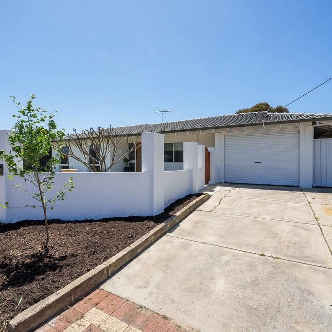 Beautifully Renovated Family Home in a Prime Location - Photo 1