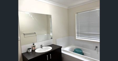 Charming Family Home in Springfield Lakes – 4 Bedrooms, 2 Bathrooms, 2 Car Parks - Photo 5