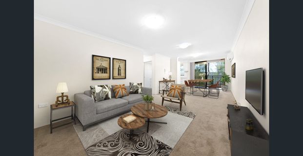 Ground Floor Unit with Air Conditioning! - Photo 1