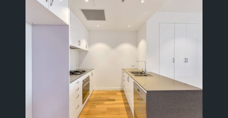 Storeys on Surflen for Easy Care City Living Awaits - Photo 4