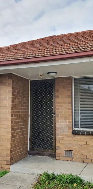 Comfortable and conveniently located, this 2-bedroom, 1-bathroom home in Thomastown is perfect for those seeking low-maintenance living. - Photo 1