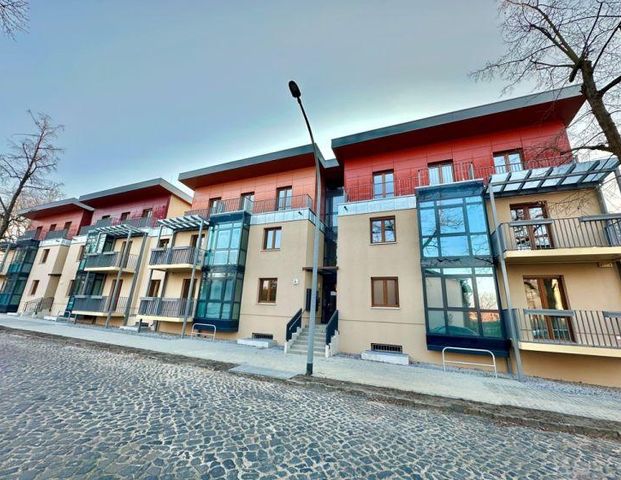 4 - Raumwohnung im Neubau mit Tiefgarage unweit des Bahnhofs - Photo 1