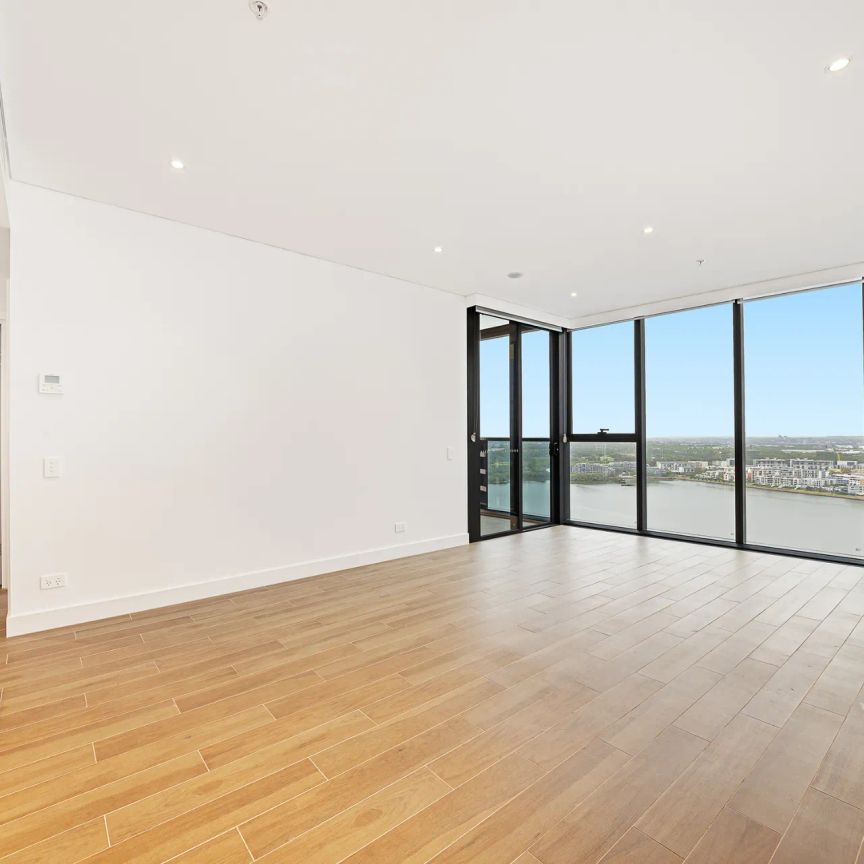 Experience Elevated Living at Rhodes Central – Level 22 - Photo 1