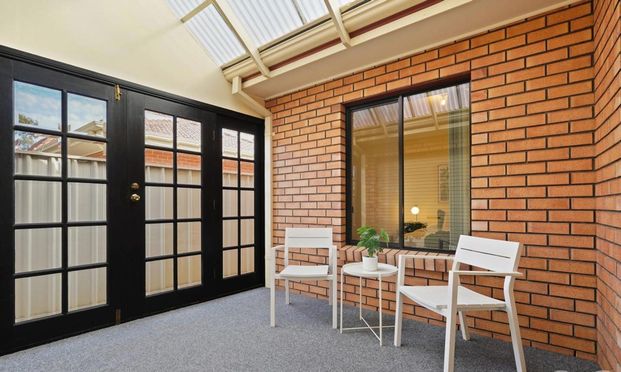 NEAT MODERN HOME IN FANTASTIC WESTERN SUBURB LOCATION - Photo 1