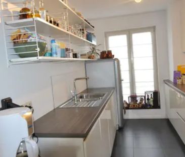 Ruim duplex appartement met terras en autostaanplaats - Photo 2