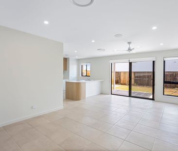 NEAR NEW 3 BEDROOM TERRACE HOME WITH DUCTED HEATING & COOLING - Photo 1