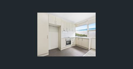 ****Renovated 2 Bedroom Apartment**** NOTE: the mural of the beach is actually affixed to the back wall of the property and not photo shopped - Photo 2