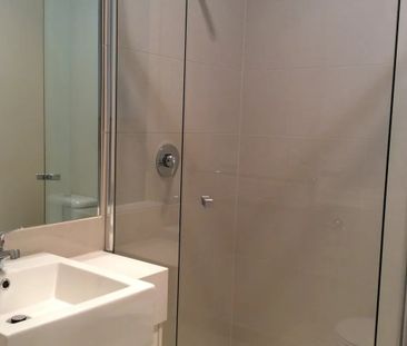 Register to Inspect // Stylish Two-Bedroom Townhouse with Dual Livi... - Photo 1