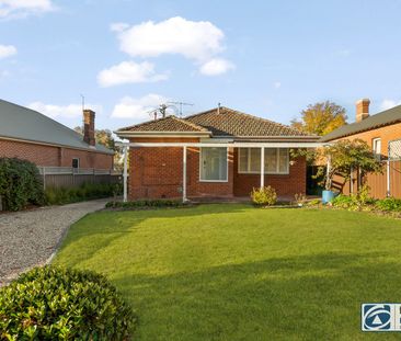 Charming CBD Cottage with Character & Sunlit Living - Photo 3