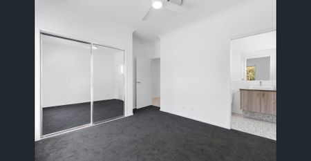 MODERN 4-BEDROOM FAMILY HOME WITH FOREST VIEWS - Photo 3