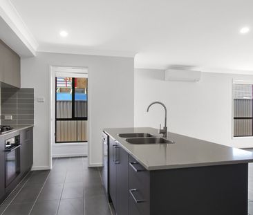 Modern Family Living in a Stunning Brand New Home - Photo 6