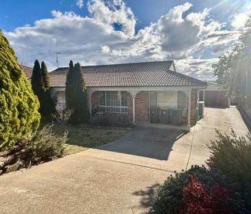 Bright Family Home with Sunroom and Outdoor Living Space - Photo 3