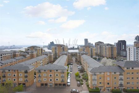 A bright and airy apartment which boasts impressive views looking towards the River Thames and Millennium Dome. - Photo 5