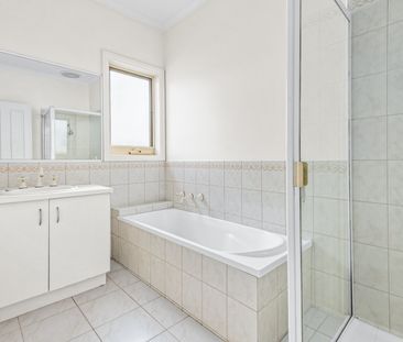 Spacious Three-Bedroom Unit with Double Garage and Outdoor Entertai... - Photo 6