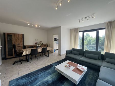 Ruim 2 slaapkamer appartement met terras en garageplaats. - Photo 3