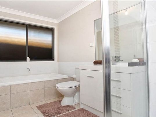 Located in Parkbridge Estate Middleton Grange - Photo 1