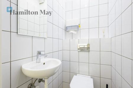 Przestronne mieszkanie 85 m² w przedwojennej kamienicy - Photo 3