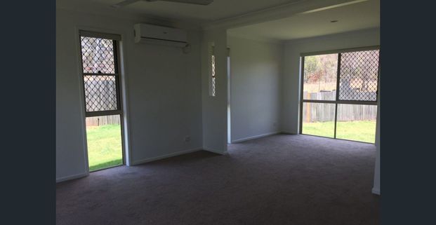 Spacious Family Home in Prime Berrinba Location - Photo 1