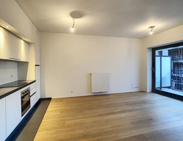 Appartement te huur in Sint-Lambrechts-Woluwe voor € 1.100 met 1 slaapkamer - Foto 1