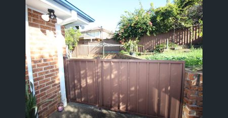 Renovated unit attached to Resident Landlord's home near Matthew Pearce Public - Photo 5