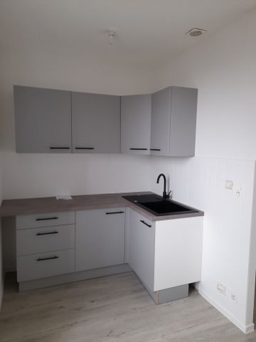T2 47.54 m²- MONTAGNY - Photo 2