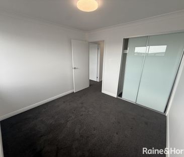 Modern Family Comfort Meets Sophisticated Design - Photo 2