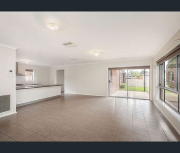 Comfortable Family Living in a Convenient Location - Photo 1