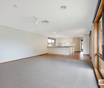 Charming 3-Bedroom Home with Outdoor Extras & Workshop! - Photo 5