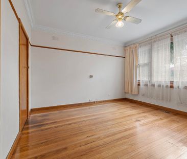 Comfortable 4-Bedroom Home in a Sought-After Location - Photo 5