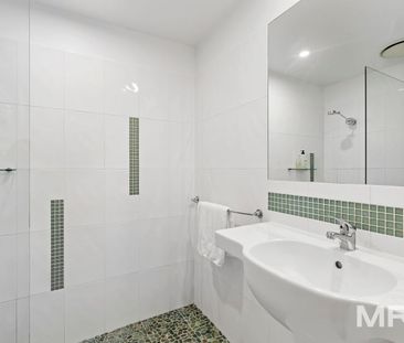 Riverfront apartment with premium city lifestyle - Photo 2