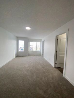 Double Garage 2710 66 St SW 3 BEDROOM | 2.5 BATHROOM TOWNHOUSE — Double Garage - Photo 1