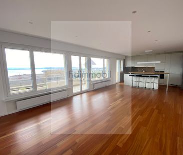 FULLY RENOVATED APARTMENT WITH STUNNING LAKE VIEWS - Photo 3